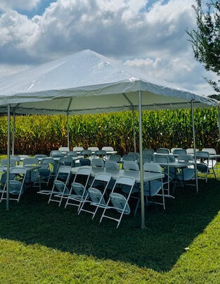 White 20x20 Pole Tent setup for outdoor party in Chesterfield VA